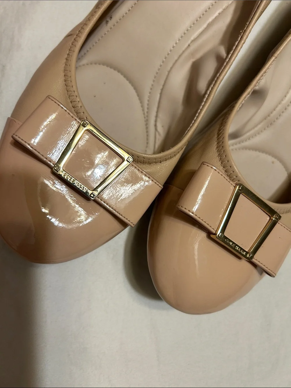 Cole Haan Beige Patent Leather Ballet Flats with Bow Accent